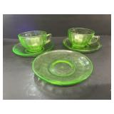 Green uranium glass tea, cups, and saucers