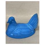 Blue hand on nest lid only