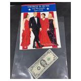 George Bush, paper dolls, and phony money