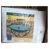 Birdbath and stand has been used