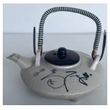 Oriental teapot signed on top