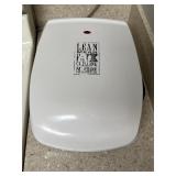 George Foreman grilling machine