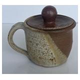 Pottery cup with lid