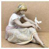 Lladro stoneware girl with bird