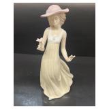 NAO handcrafted, porcelain girl with flower