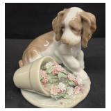 1998 Lladro dog with flower pot K ï¿½ 26