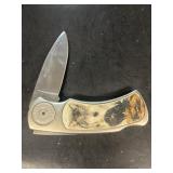 Wolf head pocket knife