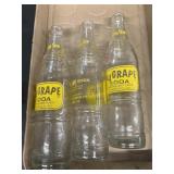 Nu  grape soda bottles