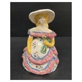 Overbeck southern Bell holding flowers