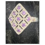 Costume jewelry ring size 8 purple stones