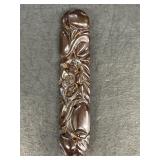 Carved bake lite brooch