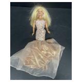 Barbie doll and peach dress
