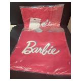 Barbie carrying bags