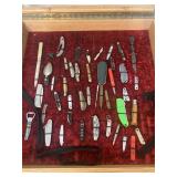 Display case with knife collection