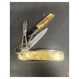 Knife with scissors, screwdriver, keychain with
