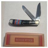 Roughrider, black blue and red pocket knife