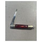 Cranberry colored handled pocket knife