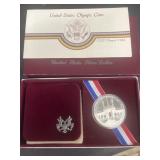 1984 silver US Olympics dollar coin