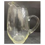 Clear, glass water, pitcher small chip on inside