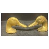 Brass duck heads