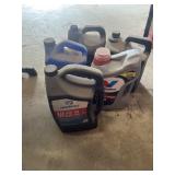 Oil partial full jug of gear oil, full jug of