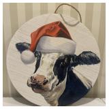 Cow wooden sign wearing Christmas hat