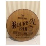 Old-fashioned bourbon bar wooden barrel lid
