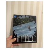 Painting of guys fishing on sawblade