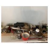 Beer, glasses jars, apple peeler kitchen items