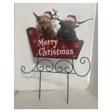 Cows a metal Christmas sign