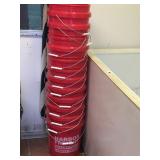 Stack of red buckets