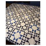 Blue white triangle quilt