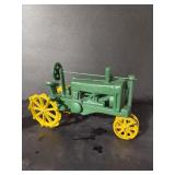 Cast-iron John Deere toy tractor