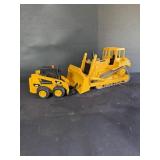 Caterpillar bulldozer, and skid loader