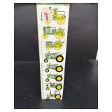 John Deere eight miniature toy tractors