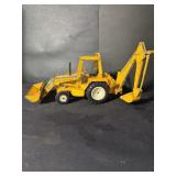 International front loader with backhoe