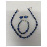 Sterling silver earrings, necklace, and bracelet