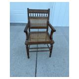 Wicker bottom armchair
