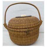 Nantucket wicker basket with hand, carved demon