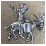 Mexican silver brooch, man on donkey