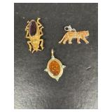 Antique bug, Jewelry brooch and lion pendant