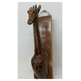 Hand carved giraffe wall hanging Kenya