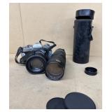 NIKKORMAT camera with extra lens