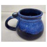 Red rock pottery blue cup