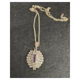Sterling silver necklace with purple stone
