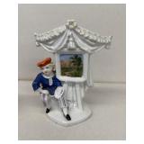 Porcelain figurine vase