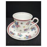 Flowers, tea, cup, and saucer
