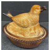 Amber slag glass bird on nest