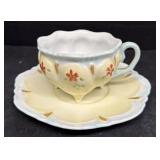 Decorative teacup and saucer