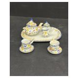Early miniature tea set teapot does have broken
